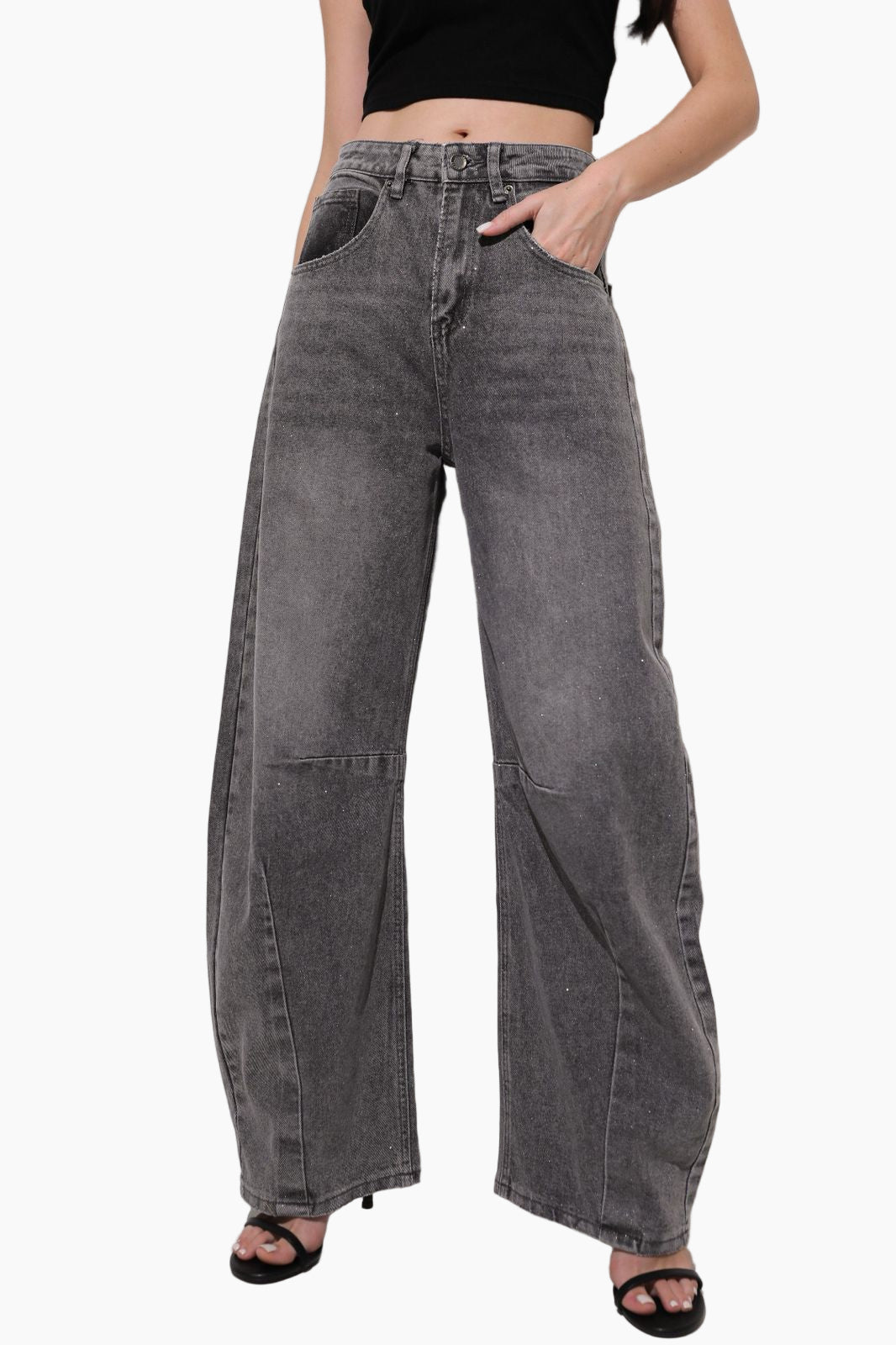 Person wearing wide-leg gray jeans