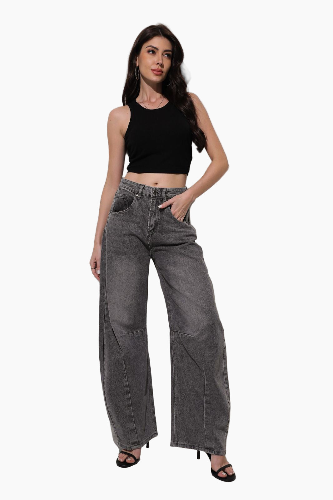 Woman wearing black top and gray wide-leg jeans 