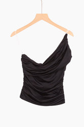 Black one-shoulder top on a hanger 