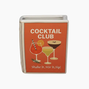 A square ceramic mug with rounded corners featuring a retro orange-red design. The design displays the text 'COCKTAIL CLUB' in white at the top and 'Shake It, Stir It, Sip!' at the bottom, with illustrations of three cocktails in the center.