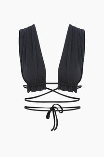 Ultra-soft bra with extended adjustable back straps and a long tie that allows multiple styling options, creating a versatile and chic look.