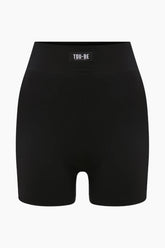 Black shorts with a visible brand label TOO-BE