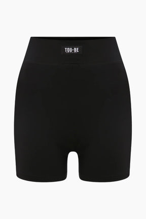 Black shorts with a visible brand label TOO-BE