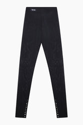  black Mesh leggings with metal buttons at the ankle.