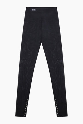  black Mesh leggings with metal buttons at the ankle.
