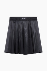 Black skirt with a brand label TOO-BE