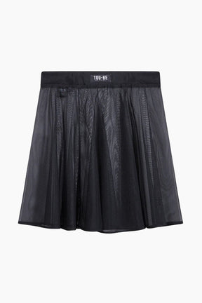 Black skirt with a brand label TOO-BE
