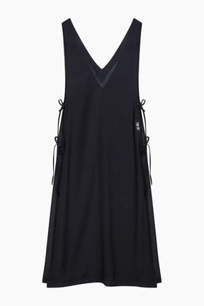 Black sleeveless dress with lace-up sides 