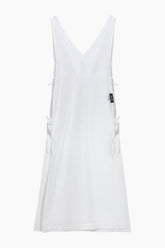 White sleeveless top with a V-neckline 