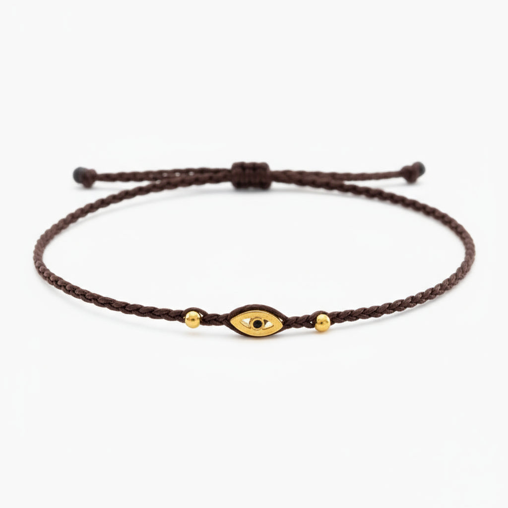 brown eye bracelet, Handmade 925 sterling silver bracelet, Gold plated in 24k with handmade wax cord braid and zircon.
Adjustable closure and size.