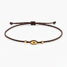 brown eye bracelet, Handmade 925 sterling silver bracelet, Gold plated in 24k with handmade wax cord braid and zircon.
Adjustable closure and size.