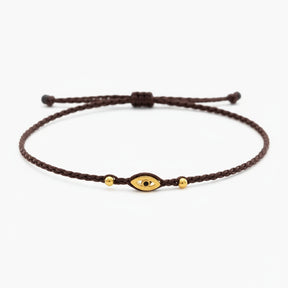 brown eye bracelet, Handmade 925 sterling silver bracelet, Gold plated in 24k with handmade wax cord braid and zircon.
Adjustable closure and size.