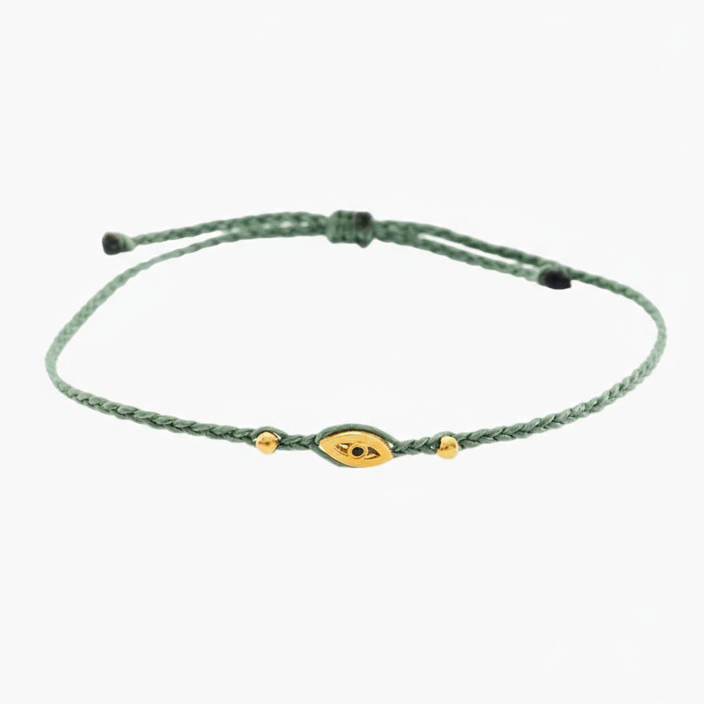 green eye bracelet, Handmade 925 sterling silver bracelet, Gold plated in 24k with handmade wax cord braid and zircon.
Adjustable closure and size.