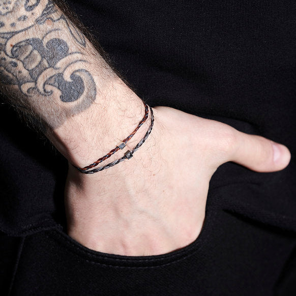 Handmade Sterling Silver 925 Bracelet with wax cord braid and silver element.