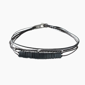 Handmade Sterling Silver 925 Bracelet with wax cord and hematite, consist of handmade braid with silver elements and a string of matt gray hematite.
