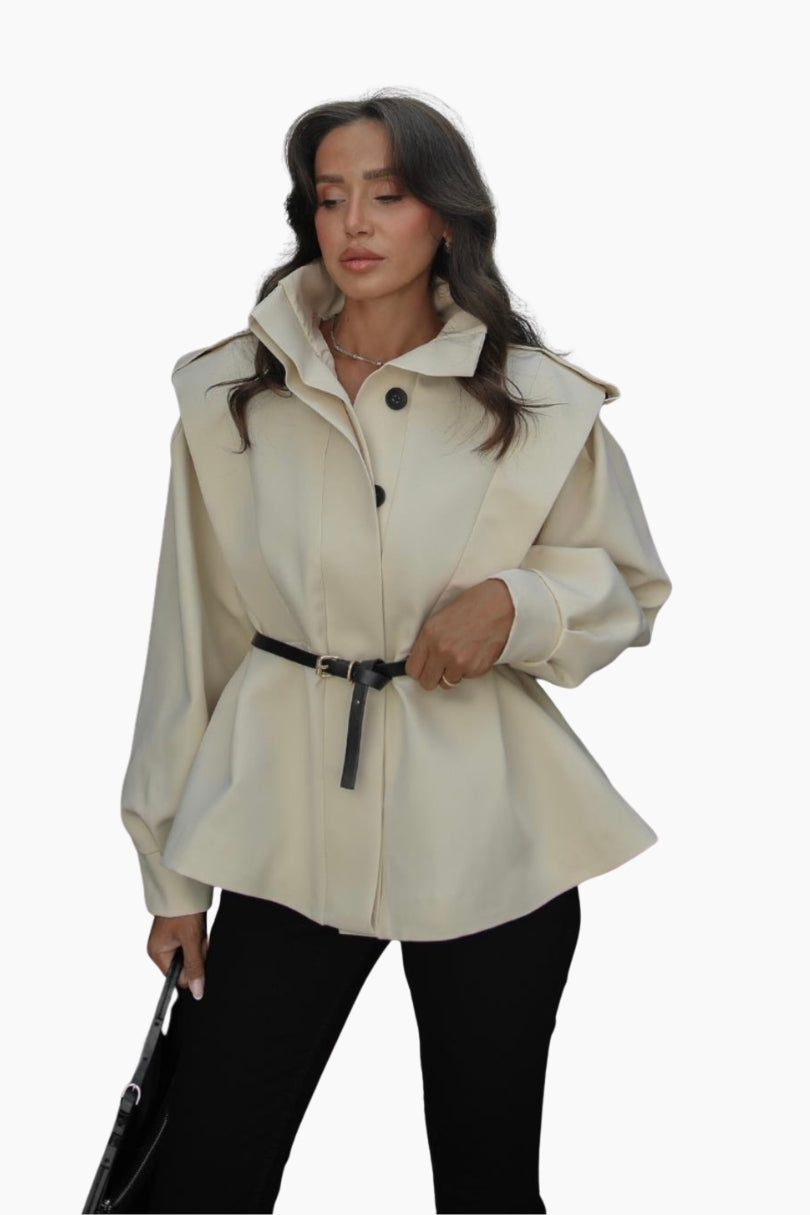 Woman wearing a beige raincoat 