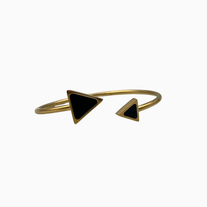 Gold bracelet with black triangle charms 