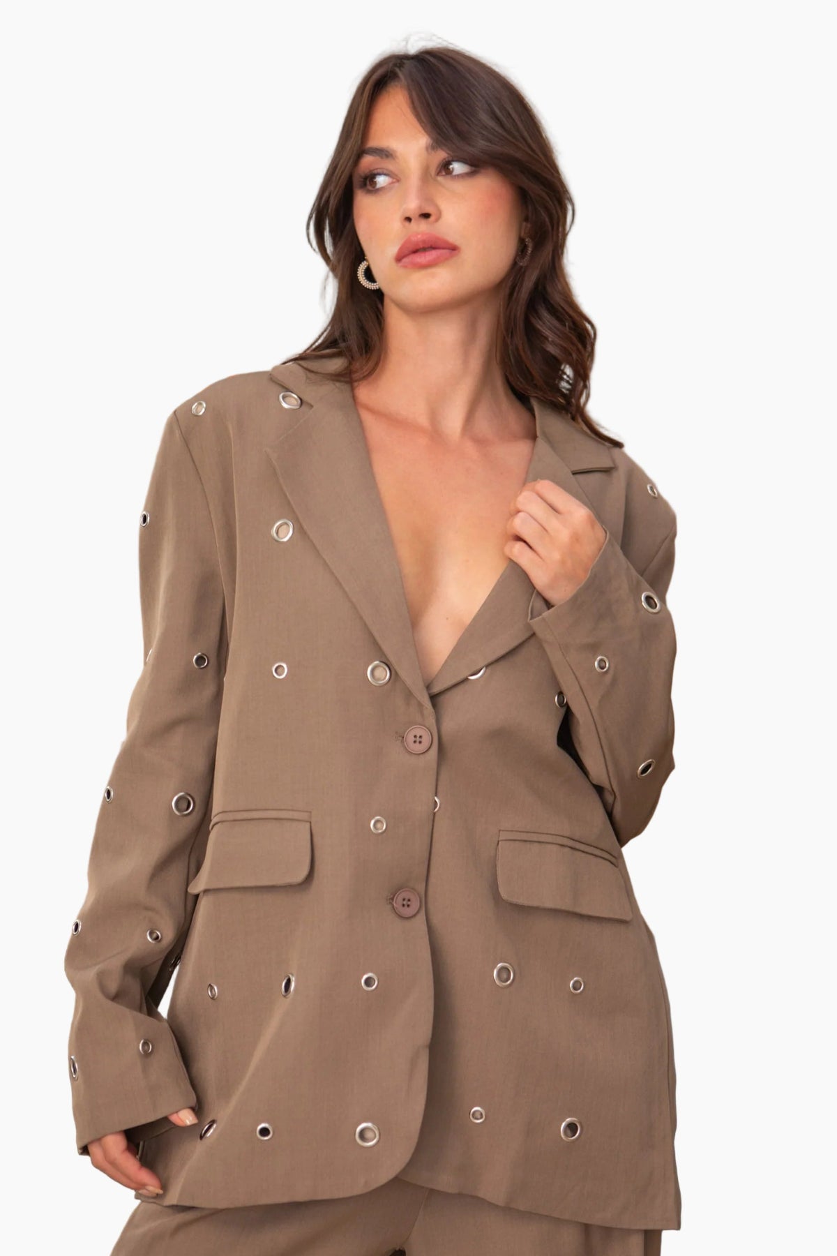 Woman wearing a brown suit 