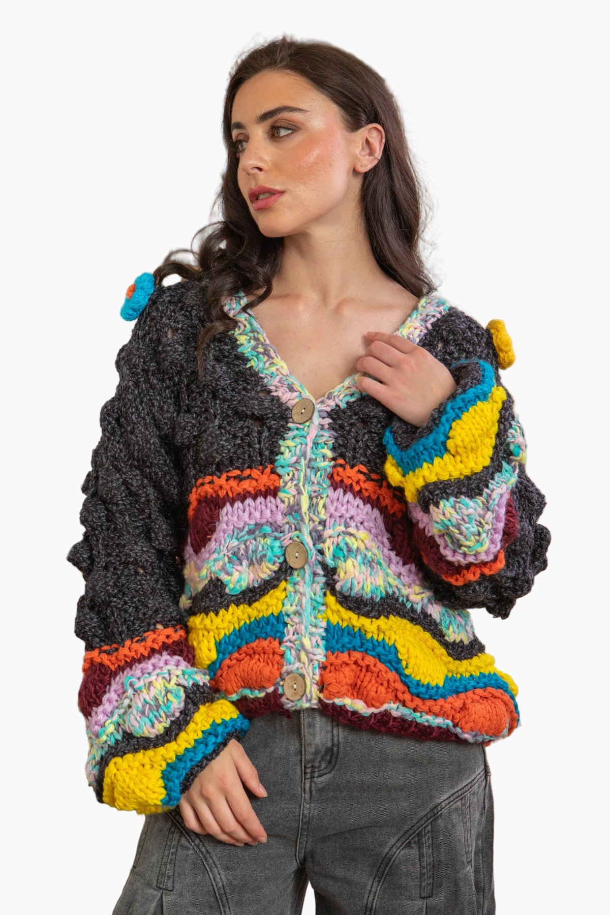 Woman wearing a colorful knitted cardigan
