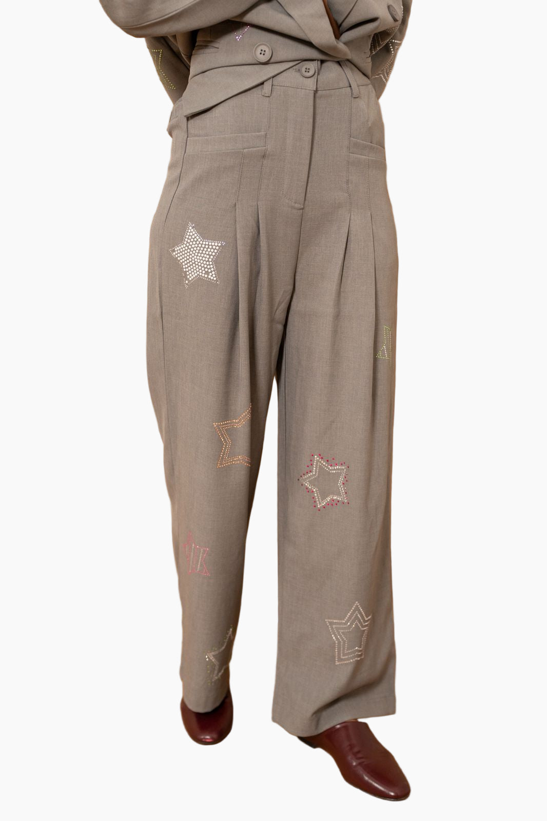 Brown pants with star patterns 