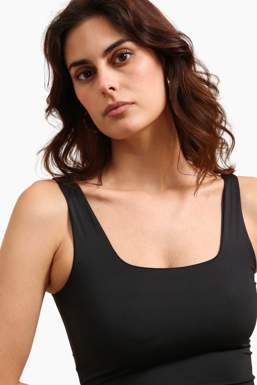 Woman wearing a black tank top