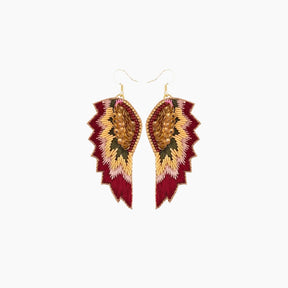 Pair of earrings with red and gold feather-like design 