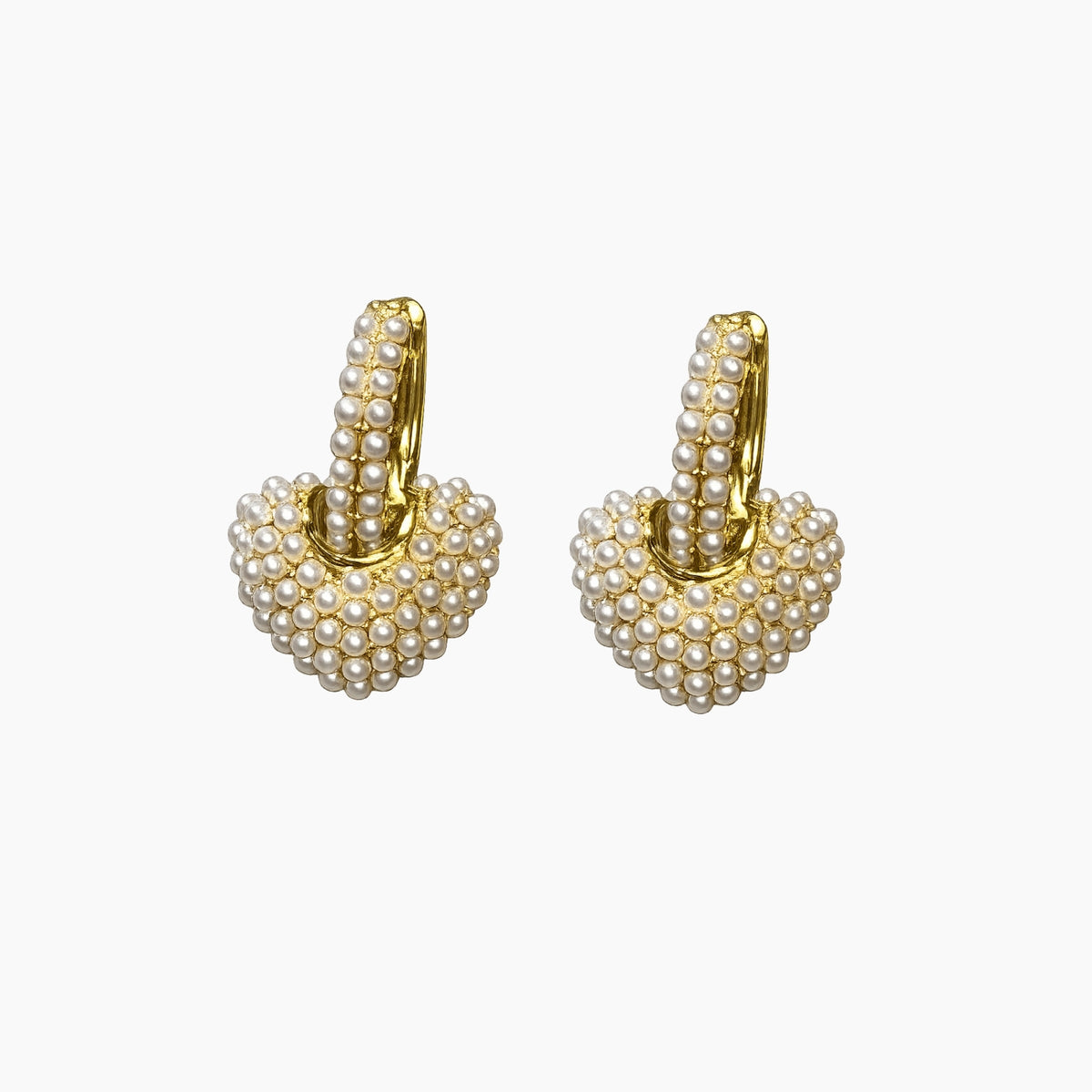 Gold hoop earrings with pearl-like beads on a white background