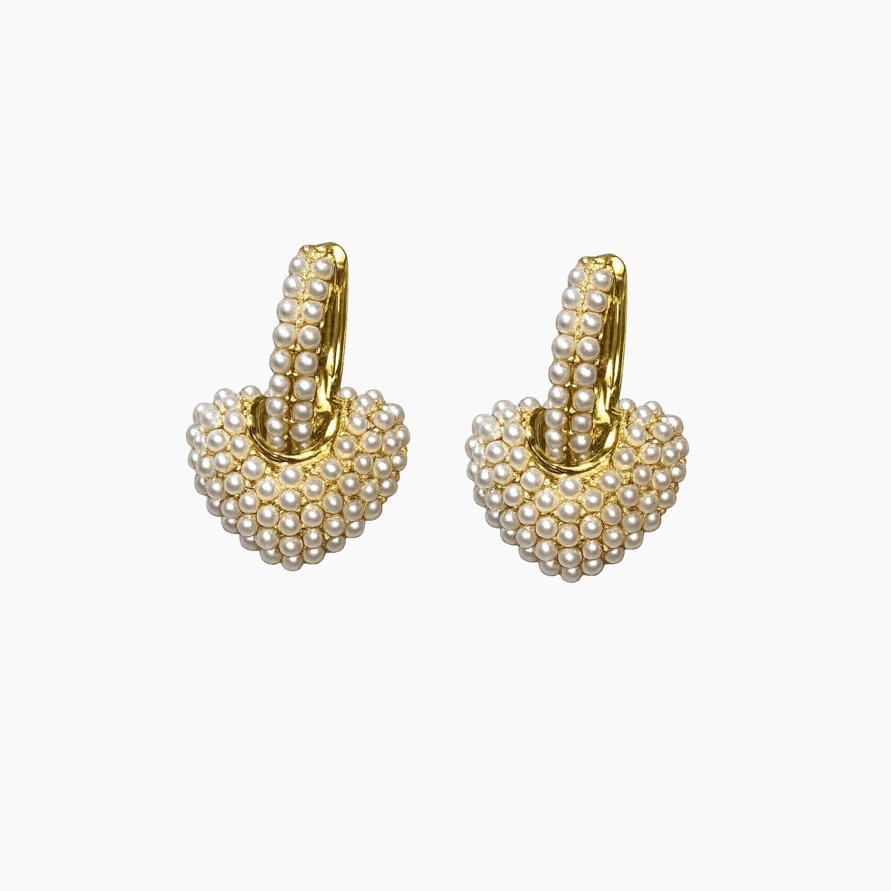 Gold hoop earrings with pearl-like beads on a white background