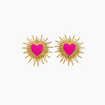 Pair of earrings with pink heart centers and gold辐射 designs on a white background
