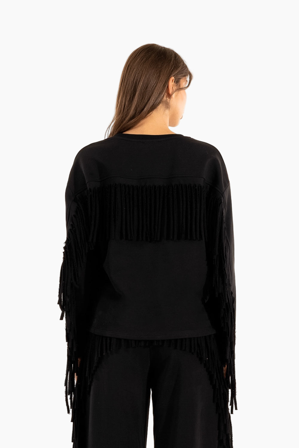 Black fringe jacket worn by a model