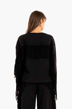 Black fringe jacket worn by a model