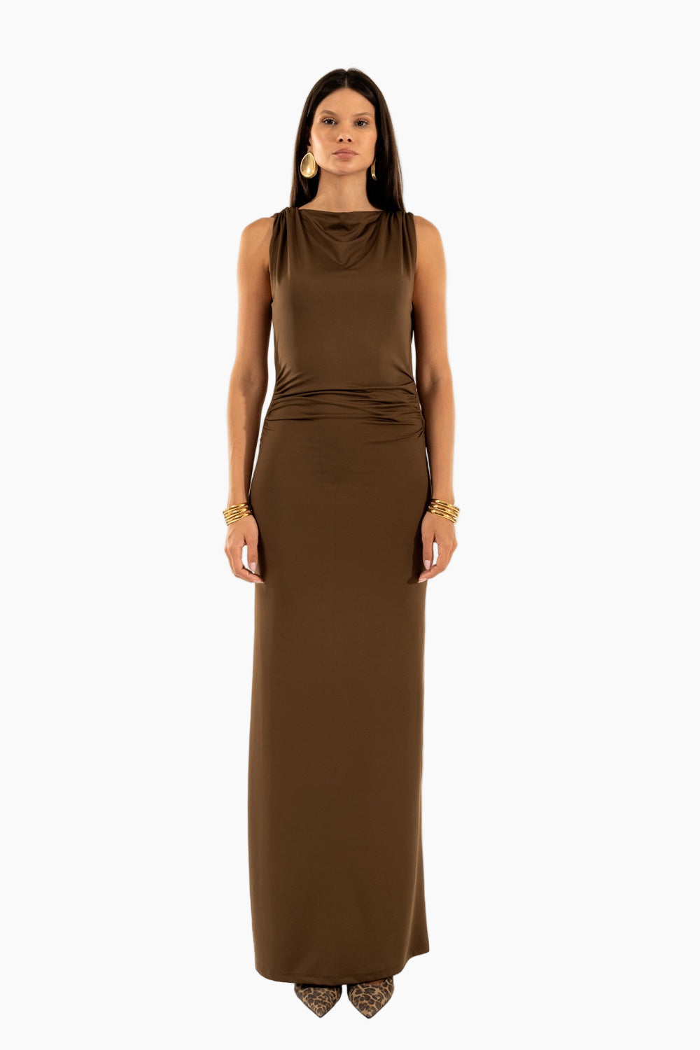Woman wearing a brown sleeveless dress 