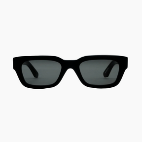 Black sunglasses with dark lenses on a white background