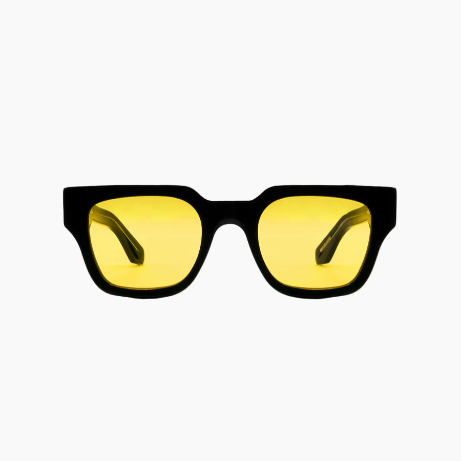 Black-framed sunglasses with yellow lenses on a white background