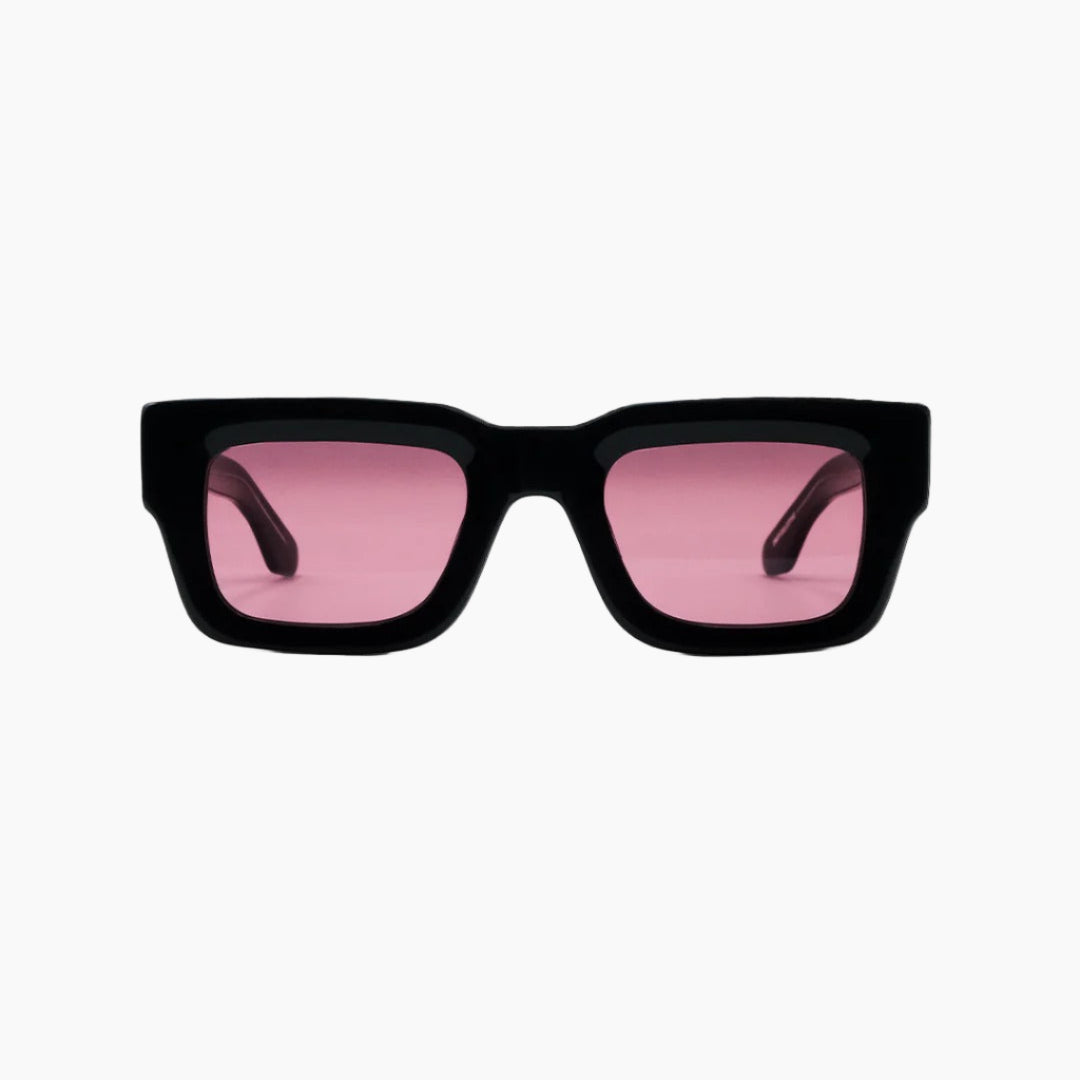 Black sunglasses with pink lenses on a white background