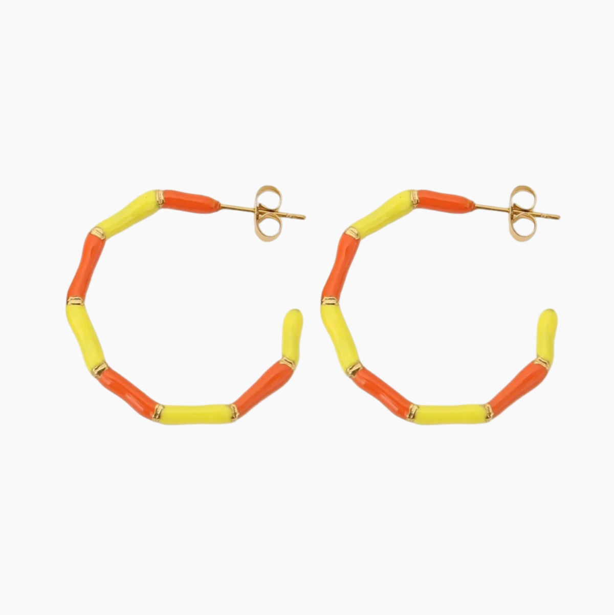 Hoop earrings with orange and yellow cylindrical beads on a white background