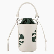White drawstring bag with green leaf patterns on a white background