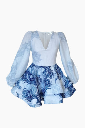 short linen dress, long and puffed sleeves, featuring a  ruffle skirt.