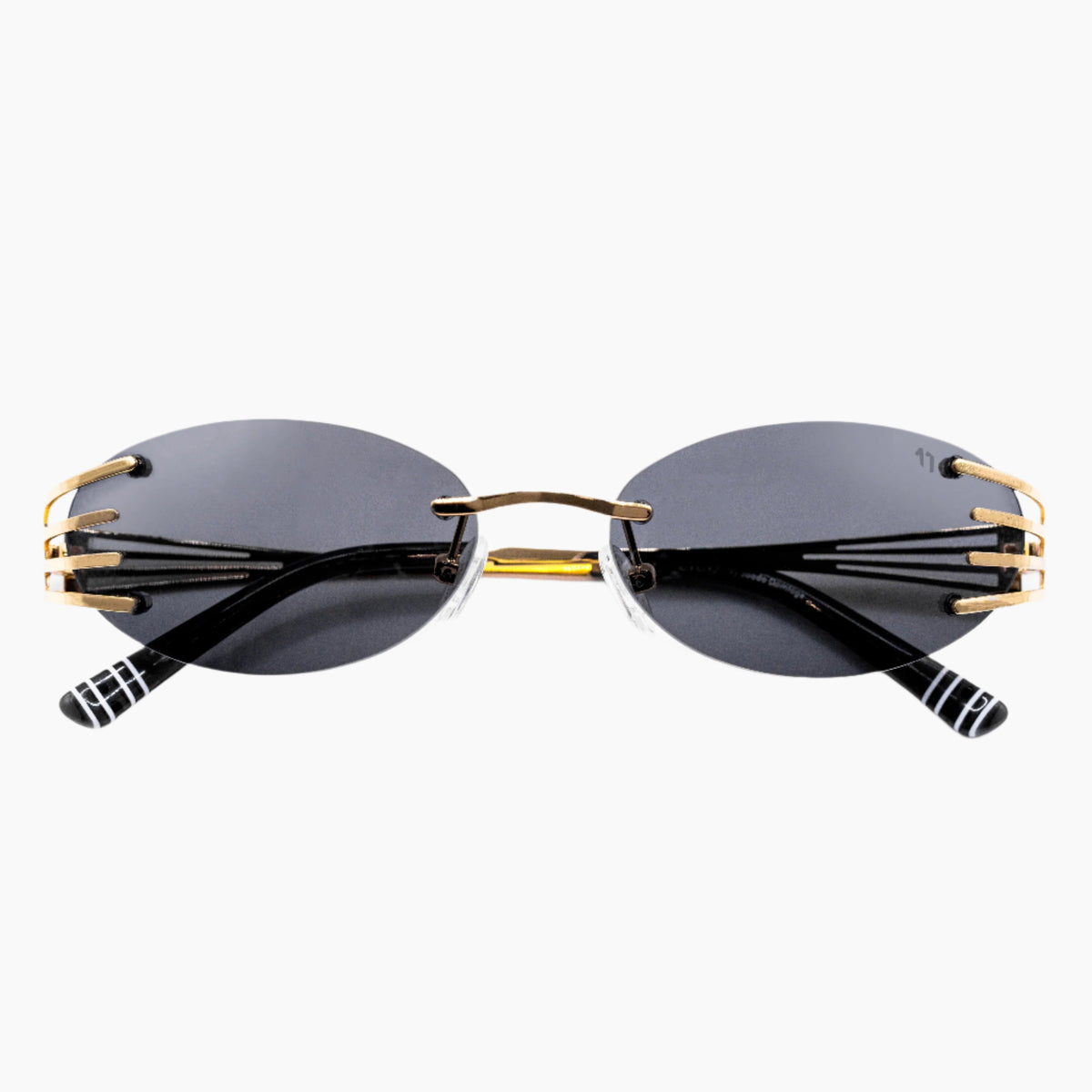 Sunglasses with gold frames and black lenses 