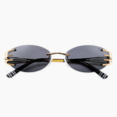 Sunglasses with gold frames and black lenses 