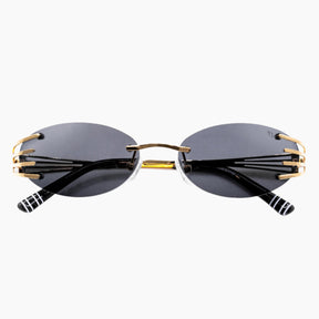 Sunglasses with gold frames and black lenses 