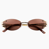 Sunglasses with gold frame and brown lenses