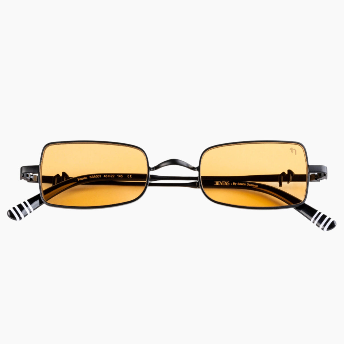 Sunglasses with gold lenses and black frames 