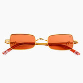 Unapologetically bold and daring, this fiery red lens paired with a gold frame commands attention. Inspired by stage lights, passion, and pure rockstar energy.