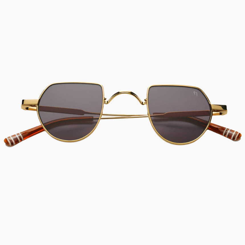 Gold-framed sunglasses with dark lenses 