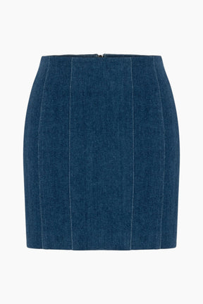  a mini denim skirt, Secured with a metallic zipper. Vertical patterns.
