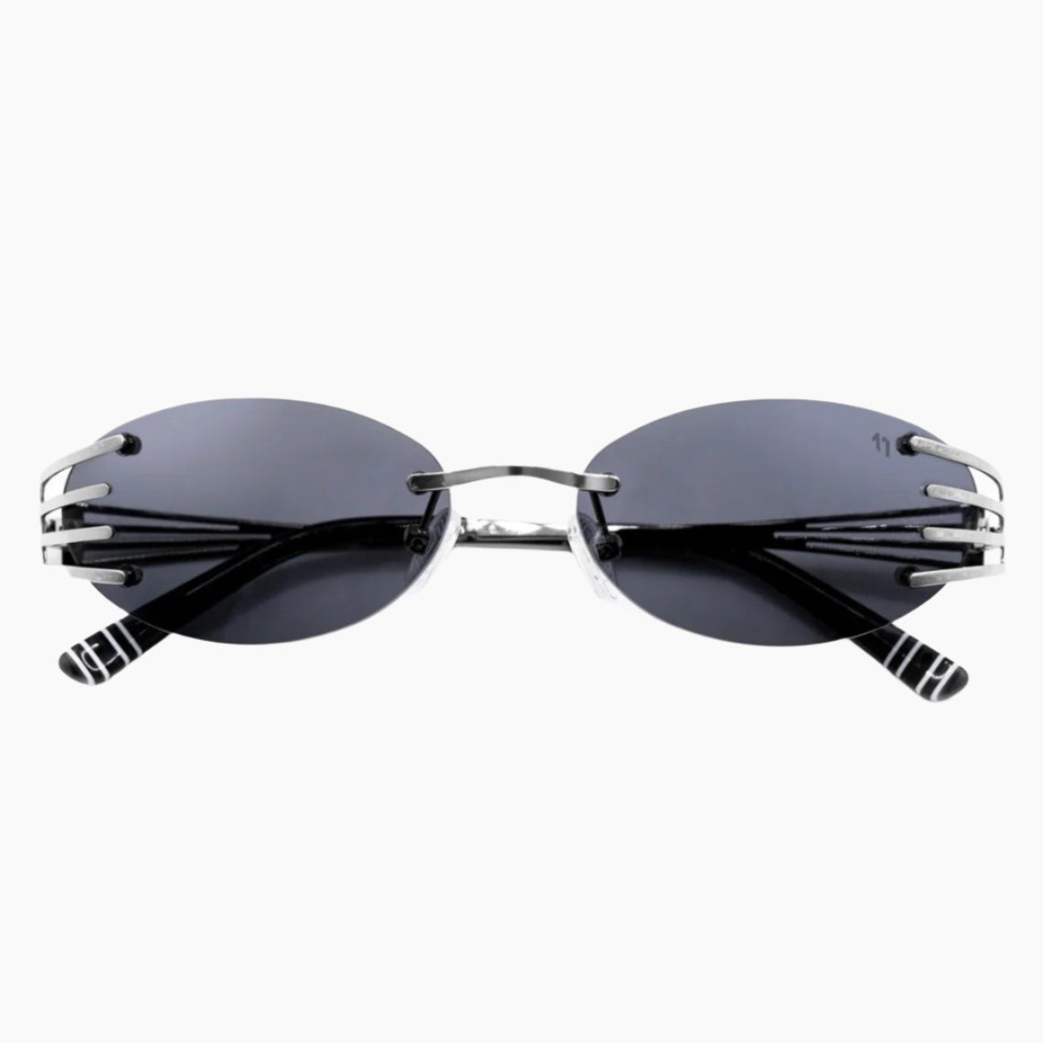 Sunglasses with black lenses and thin metal frame 