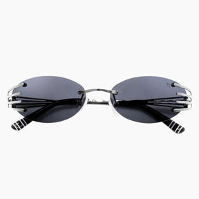 Sunglasses with black lenses and thin metal frame 