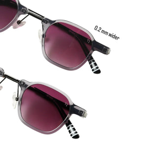 Sunglasses with dark pink lenses and striped arms 