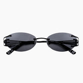 Black sunglasses with thin frames on a white background